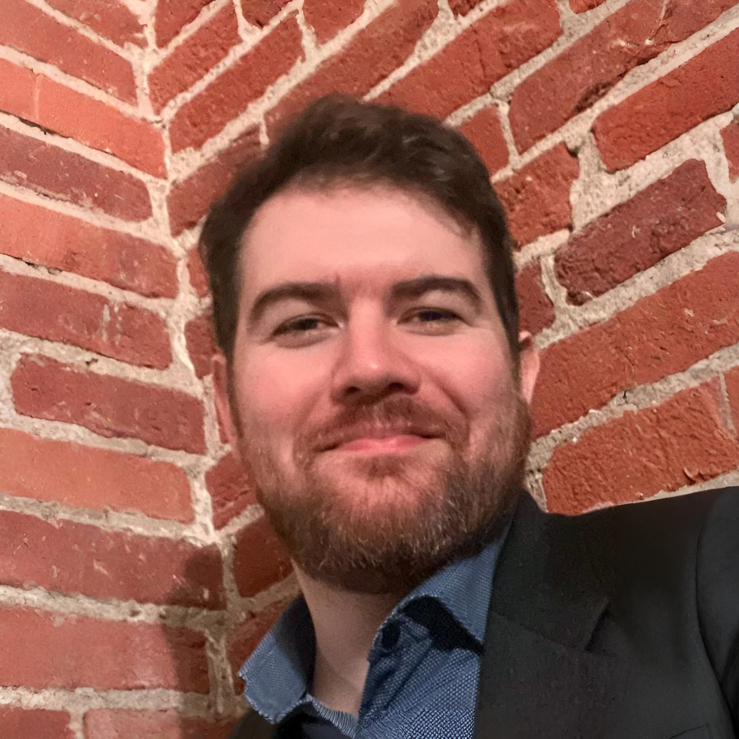 A somewhat-less professional headshot of Jon.